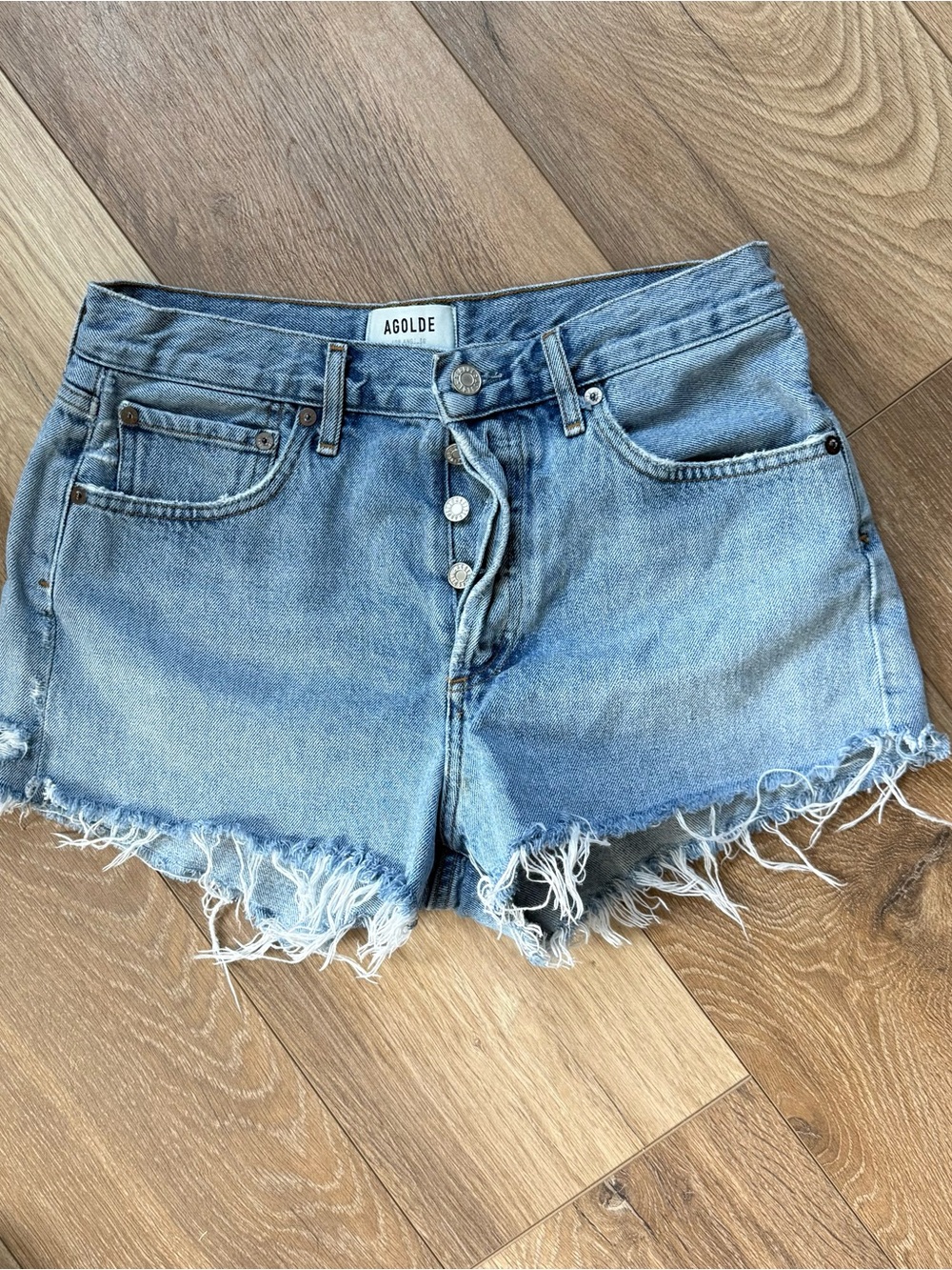 Agolde Light Wash Distressed Button-Fly Jean Shorts